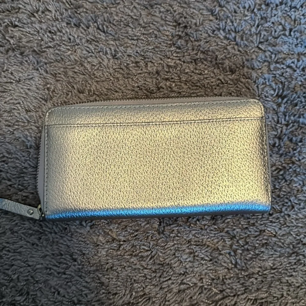 Like new gold Kate Spade zip wallet